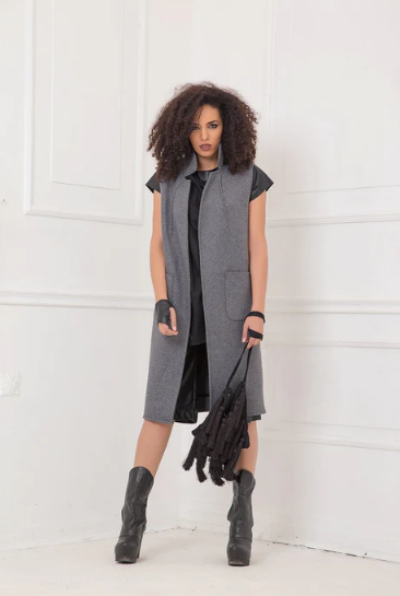 Minimalistic knee length sleeveless vest coat in wool fabric: |DARAH|