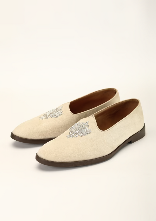 Light Beige Juttis In Suede With Zari Embroidered Motif